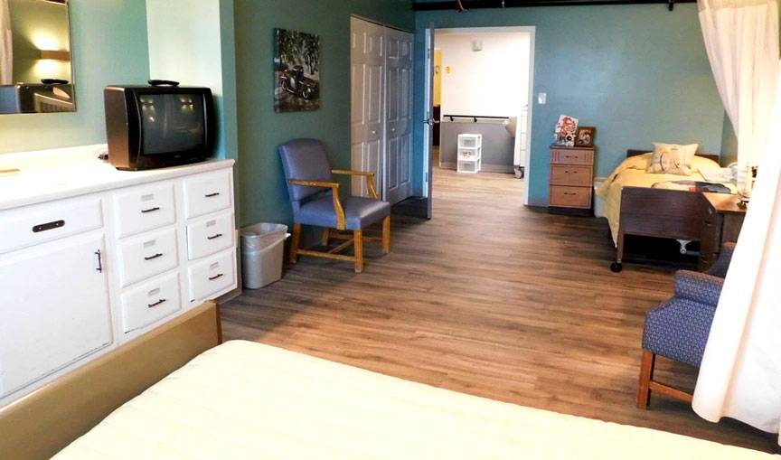 An interior shot of a bedroom at the Fairview Rehabilitation and Healthcare facility, from the Fairview Gallery.